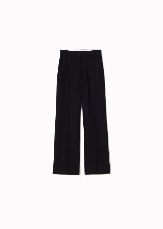 TAILORED TROUSERS IN BLUE WOOL GABARDINE made by Plan C