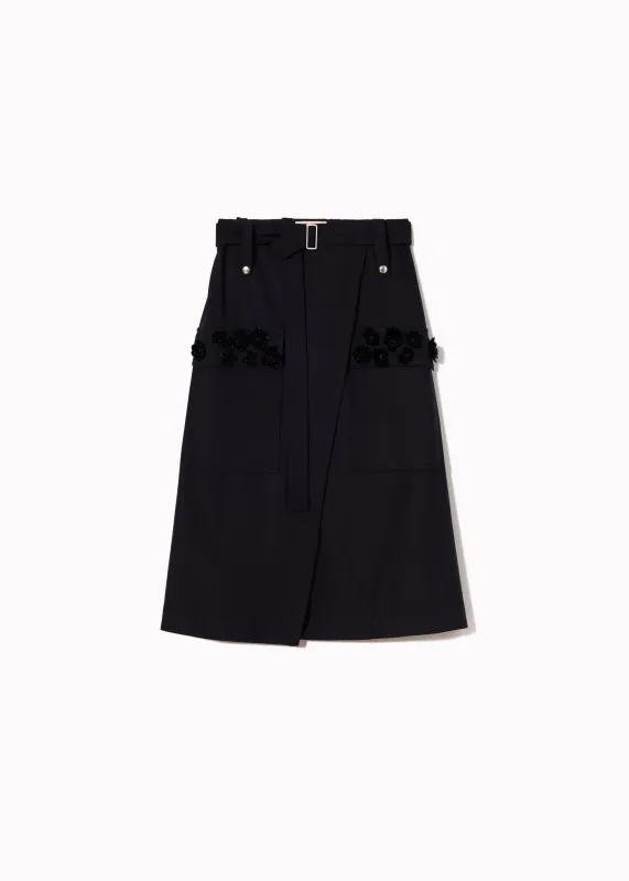 BLUE WRAP SKIRT WITH EMBROIDERED POCKETS made by Plan C