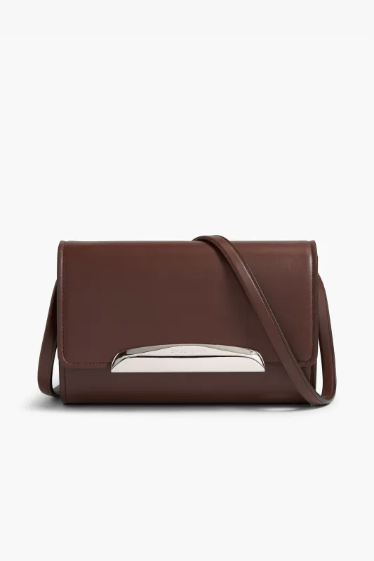 The Louise Pochette Bag in Espresso Leather sold by Brandon Maxwell
