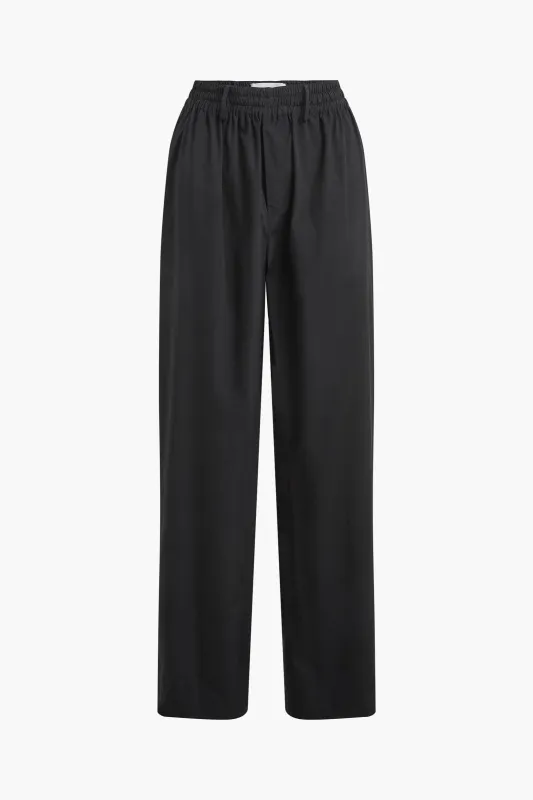 The Teagan Relaxed Track Pant in Black sold by Brandon Maxwell