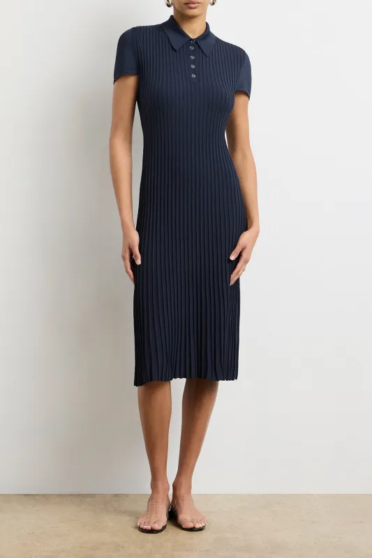 The Joyce Midi Polo Dress in Navy sold by Brandon Maxwell