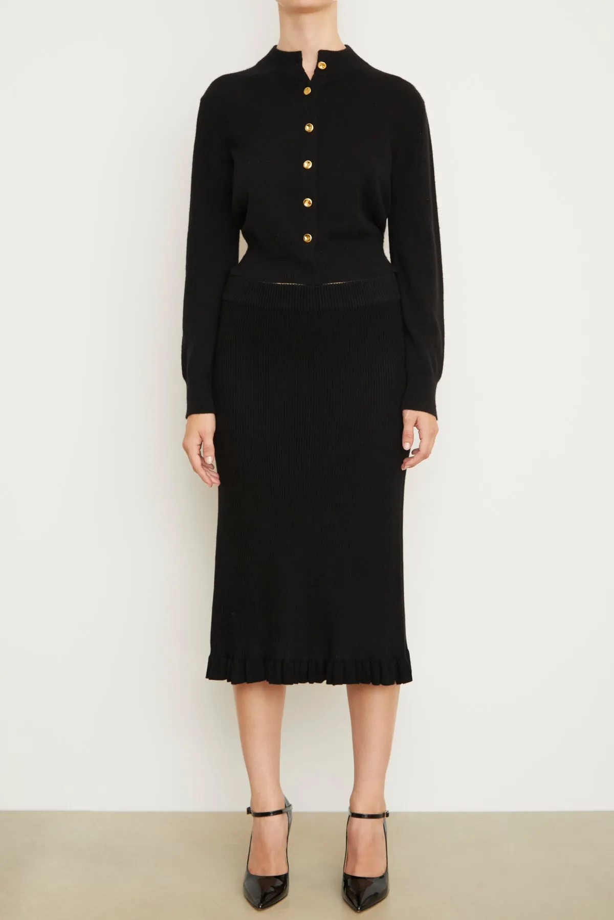 The Grace Cashmere Midi Skirt in Black sold by Brandon Maxwell