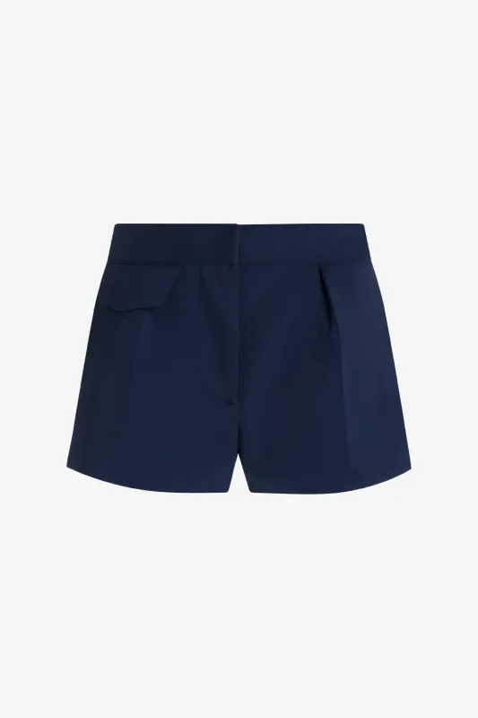 The Nedra Tailored Knit Shorts in Navy made by Brandon Maxwell