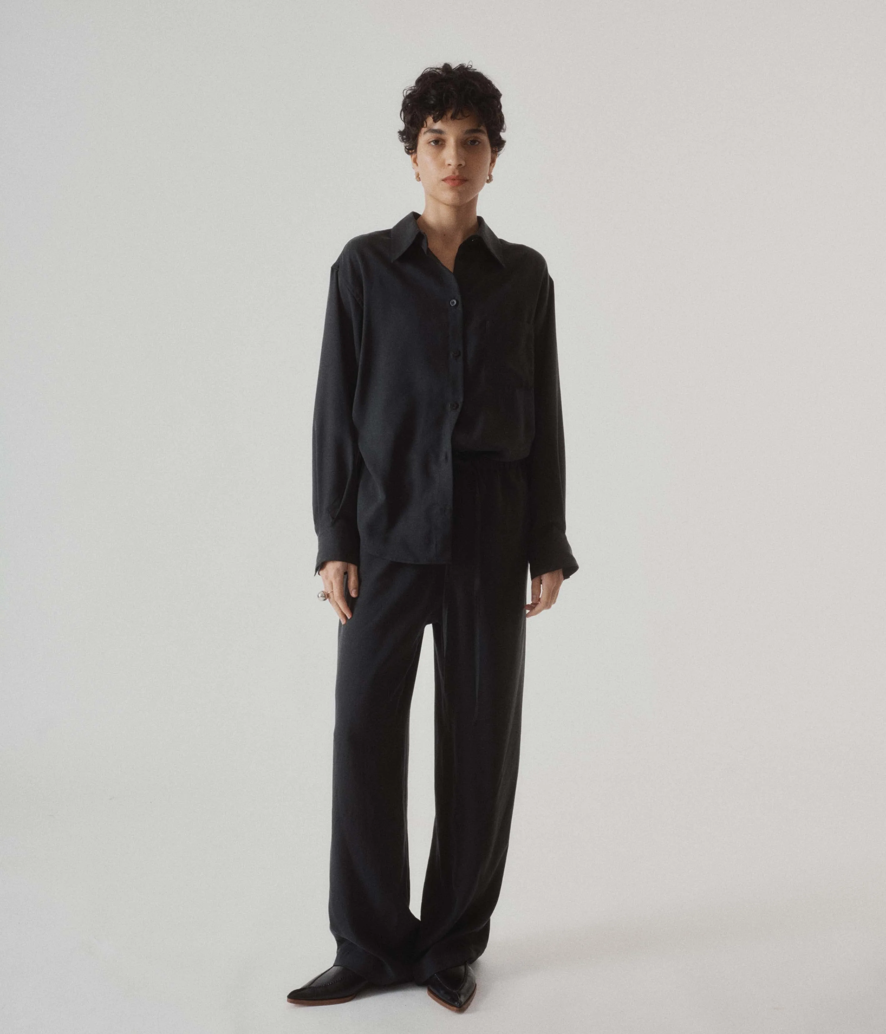 PULL-ON JUMPSUIT IN CHARCOAL sold by Sayaka Davis