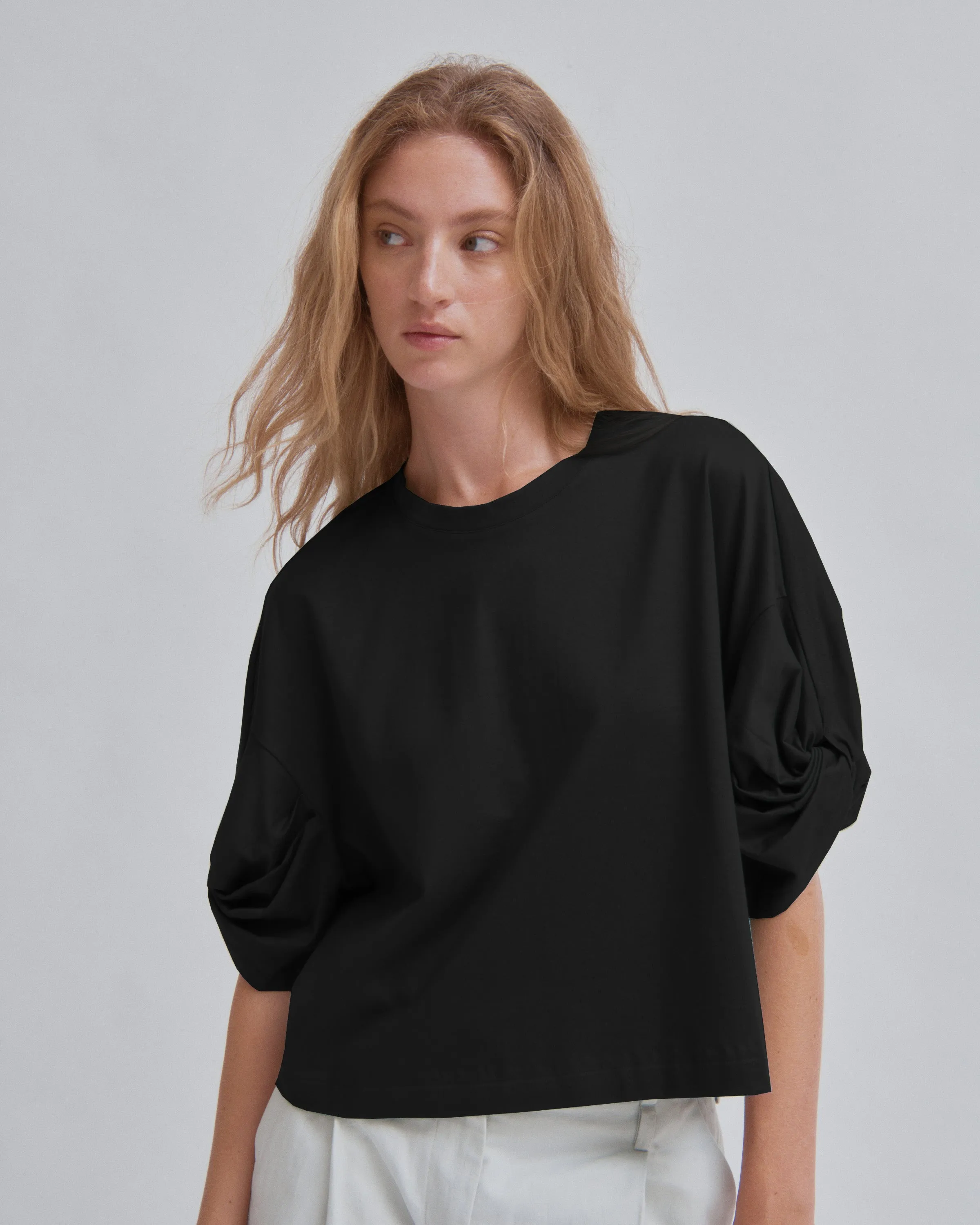 Twisted Sleeve Tee in Black sold by Sayaka Davis