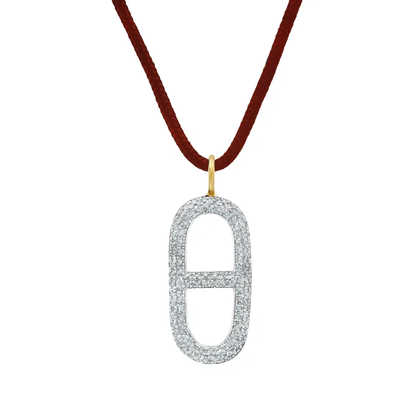 Stirrup Pendant on Cord made by Gabriela Artigas