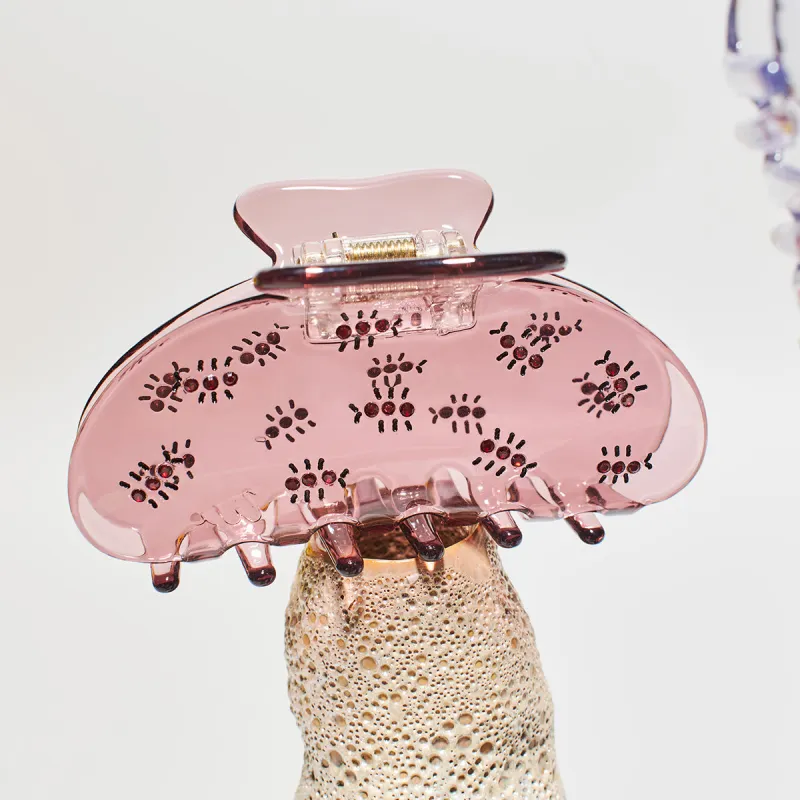 Fire Ant Hair Claw sold by Winona Irene