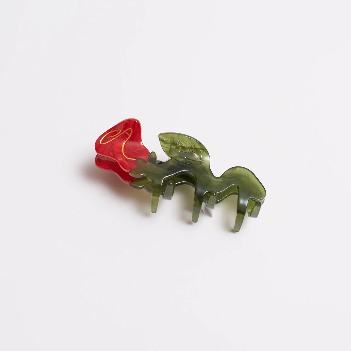 Squiggle Rose Claw sold by Winona Irene