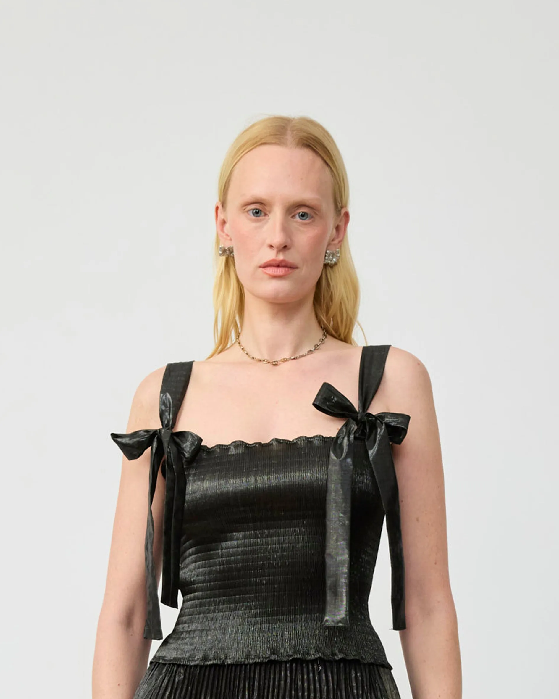 JUNE SMOCK PLEATED TOP IN MOSS METALLIC sold by Julia Heuer