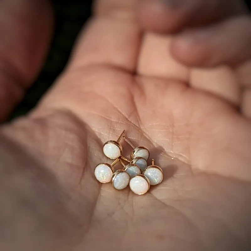 Opal Studs - White sold by Vanderzee