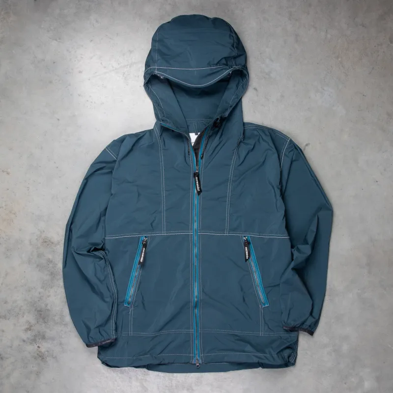 And Wander Pertex Wind Jacket Dark Blue made by and WANDER