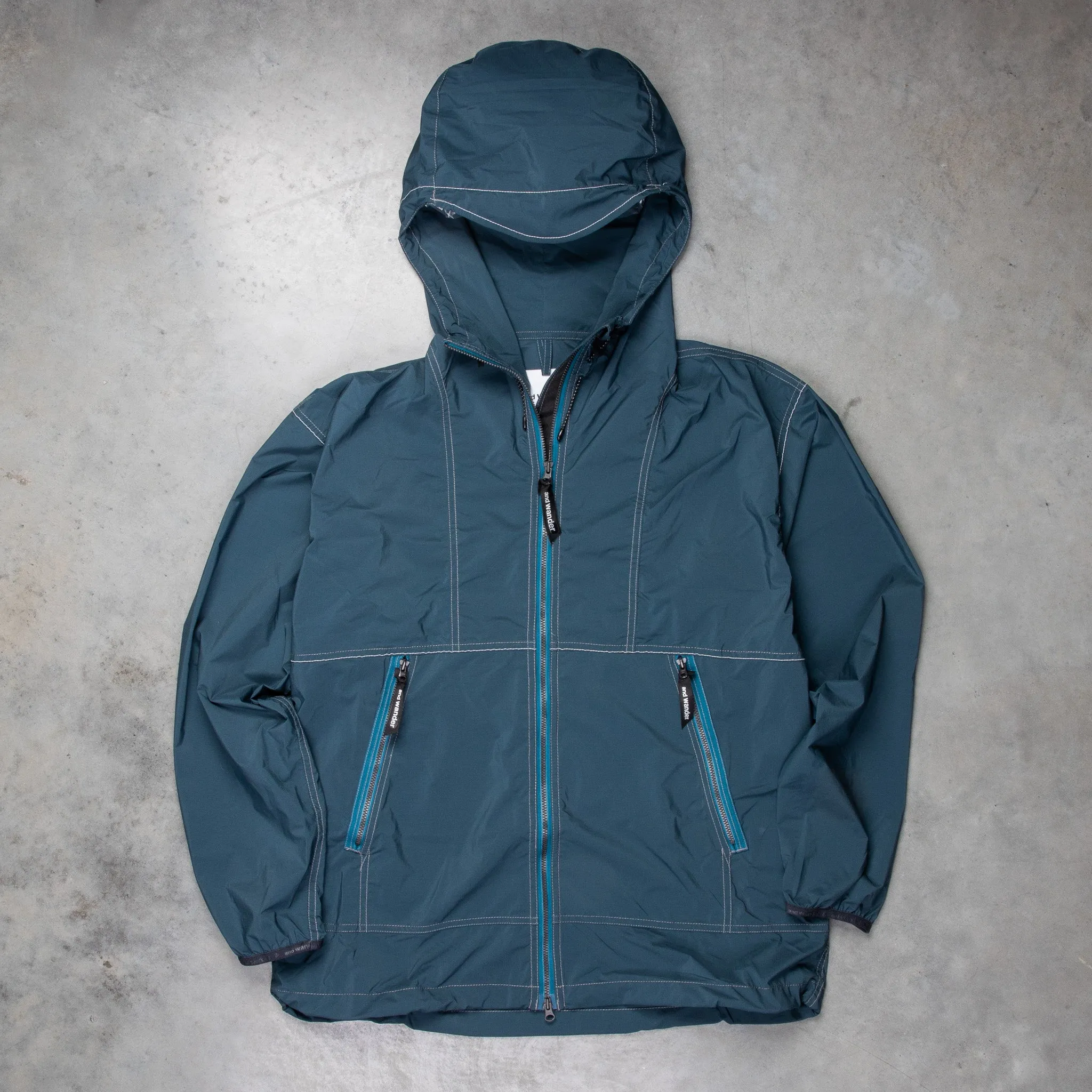 And Wander Pertex Wind Jacket Dark Blue sold by Frans Boone