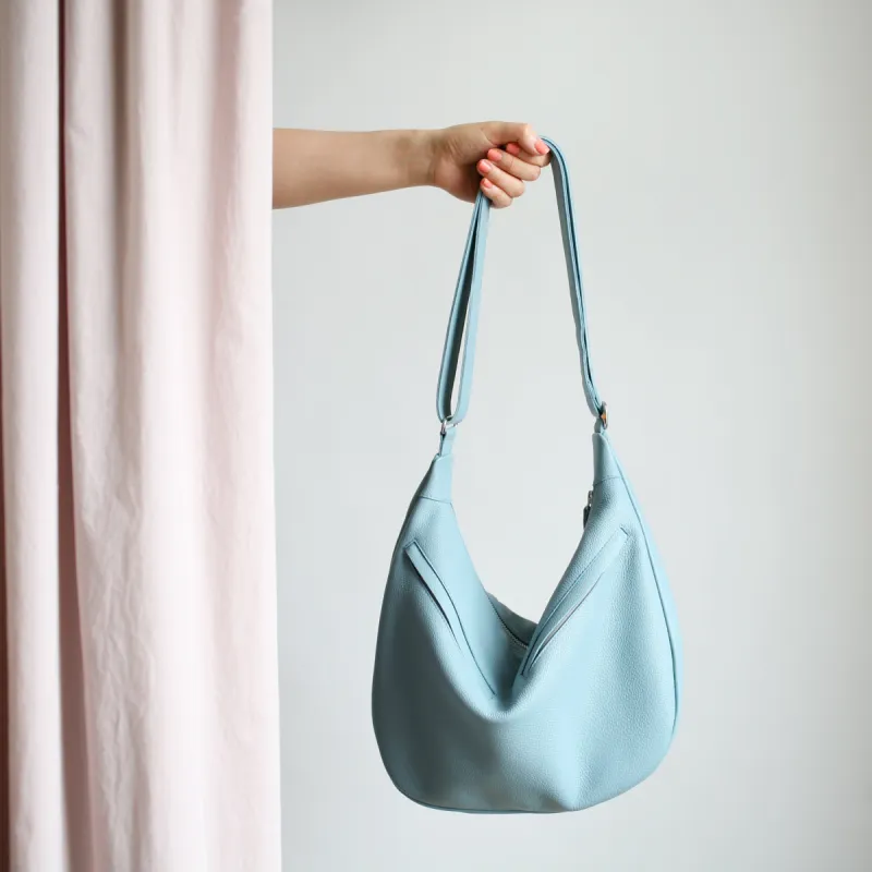 Lederbeutel BANANA Taubenblau sold by Alex Bender