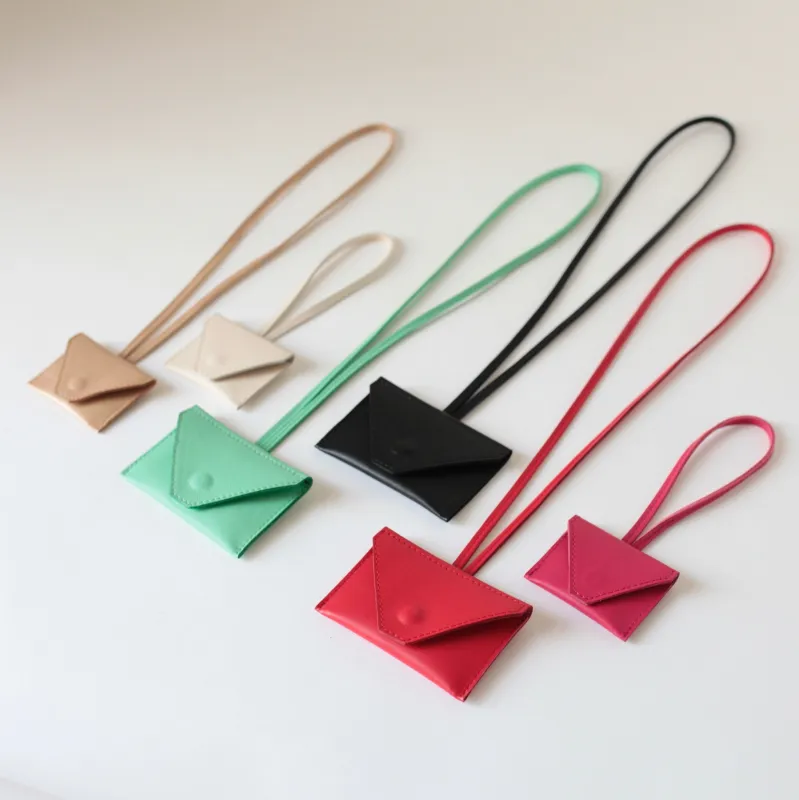 Miniportemonnaie mit Lederband in 6 Farben sold by Alex Bender