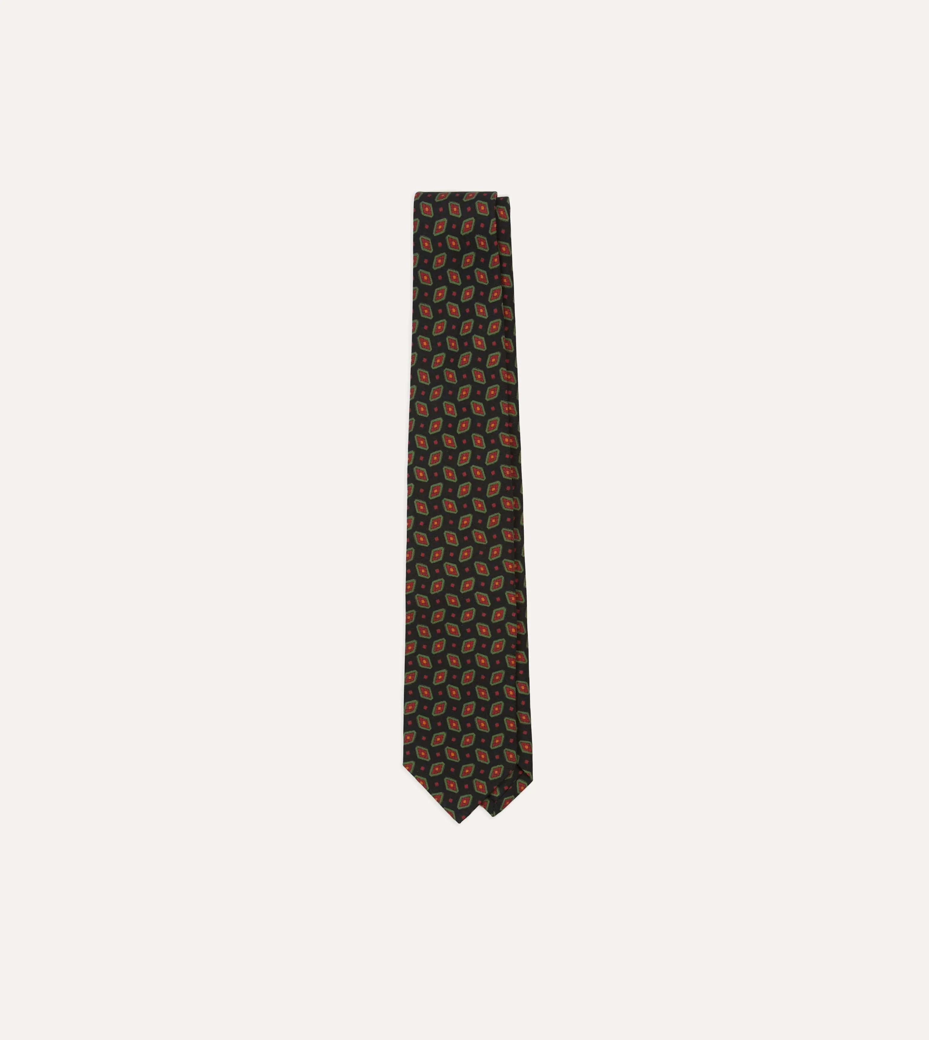 Navy Medallion Print Madder Silk Self-Tipped Tie sold by Drake's London