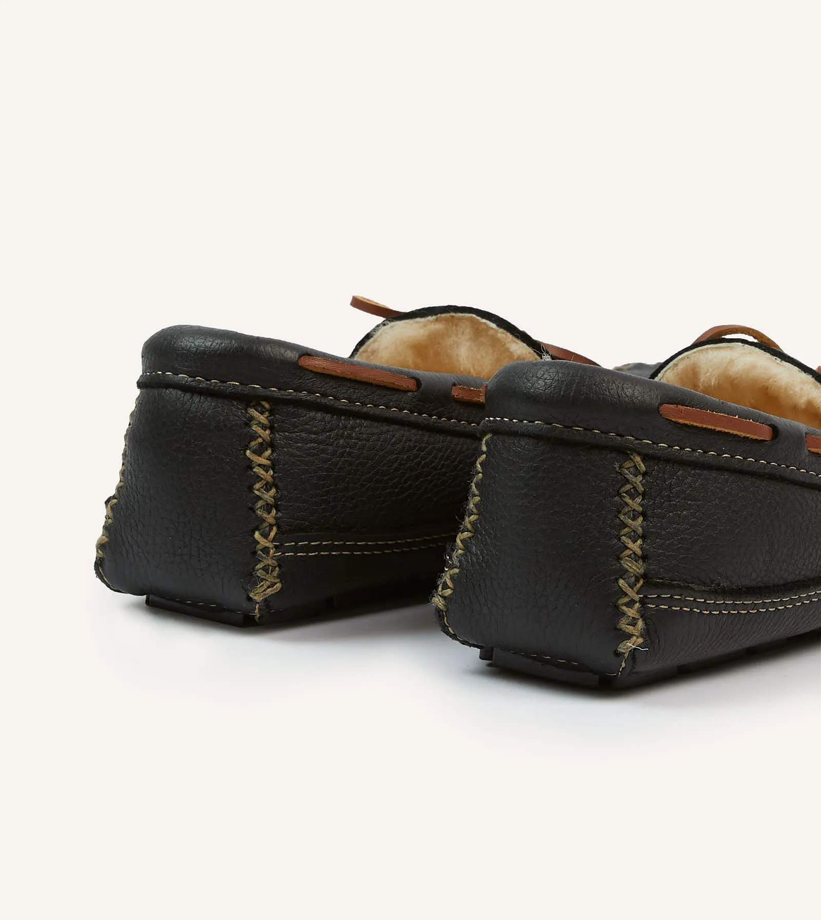 Minnetonka Black Sheepskin Lined Moose Slipper sold by Drake's London product image thumbnail 5