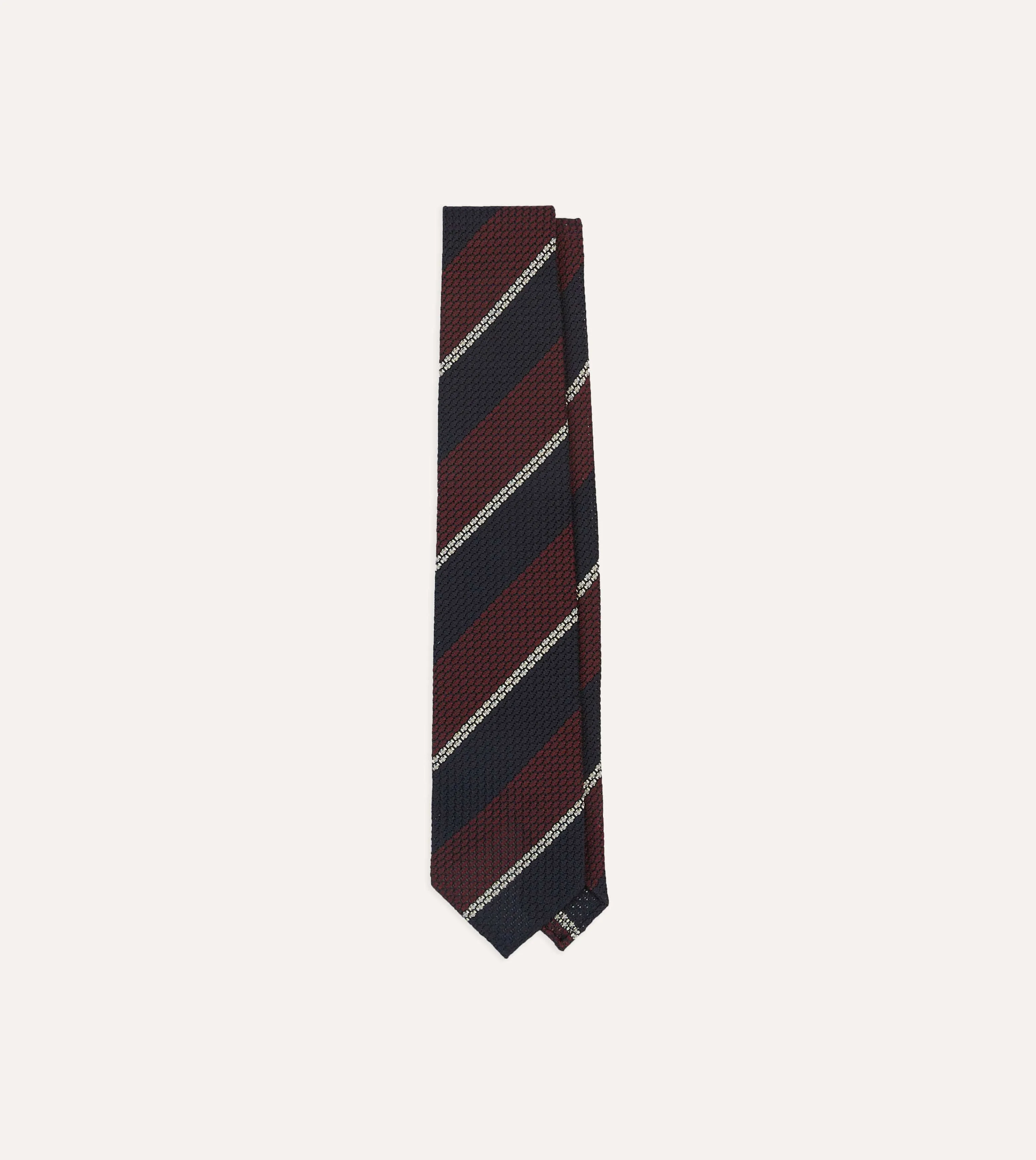 Navy, Red and White Multi Stripe Hand Rolled Silk Grenadine Tie sold by Drake's London