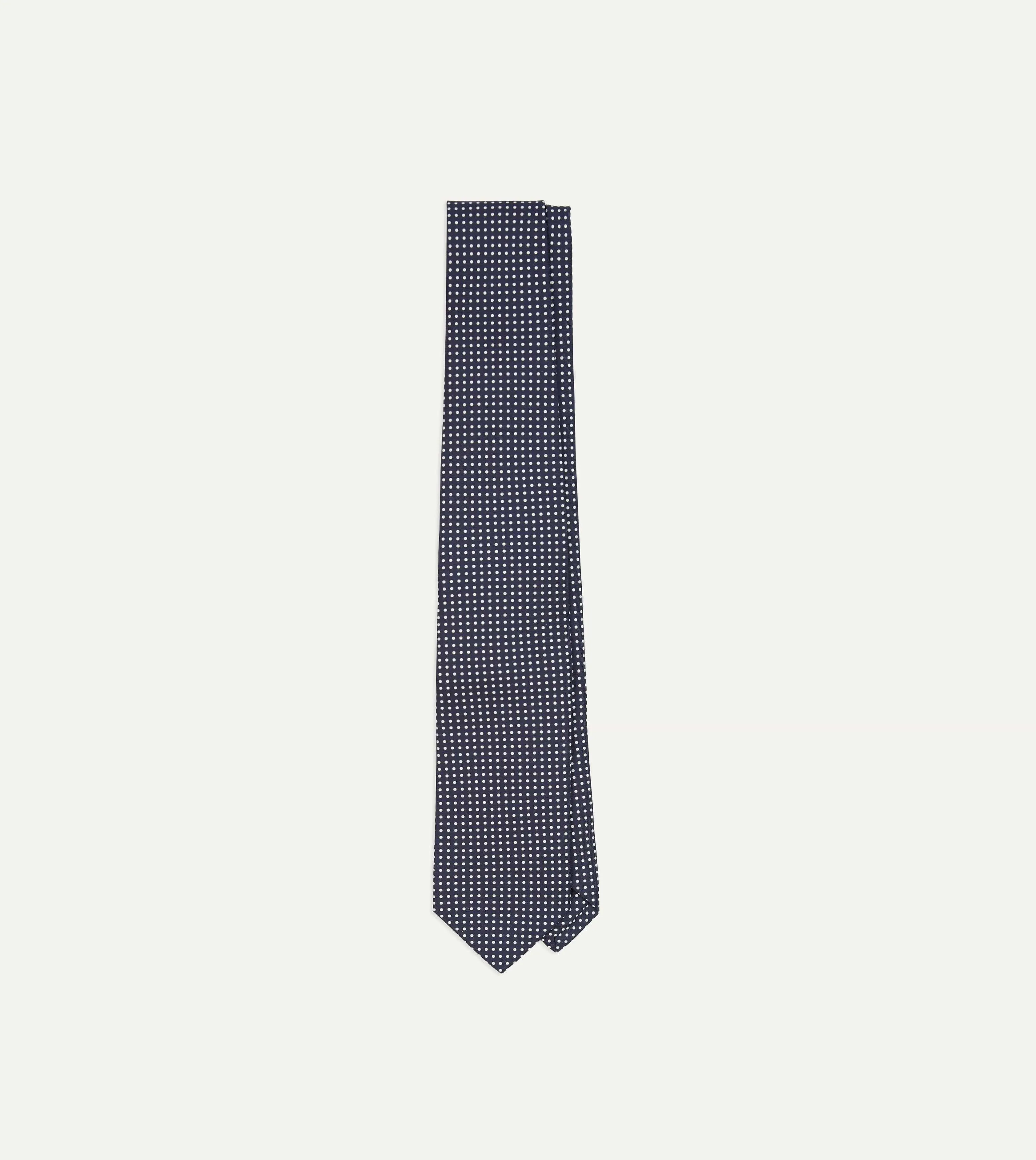 Navy Micro Polka Dot Silk Self-Tipped Tie sold by Drake's London