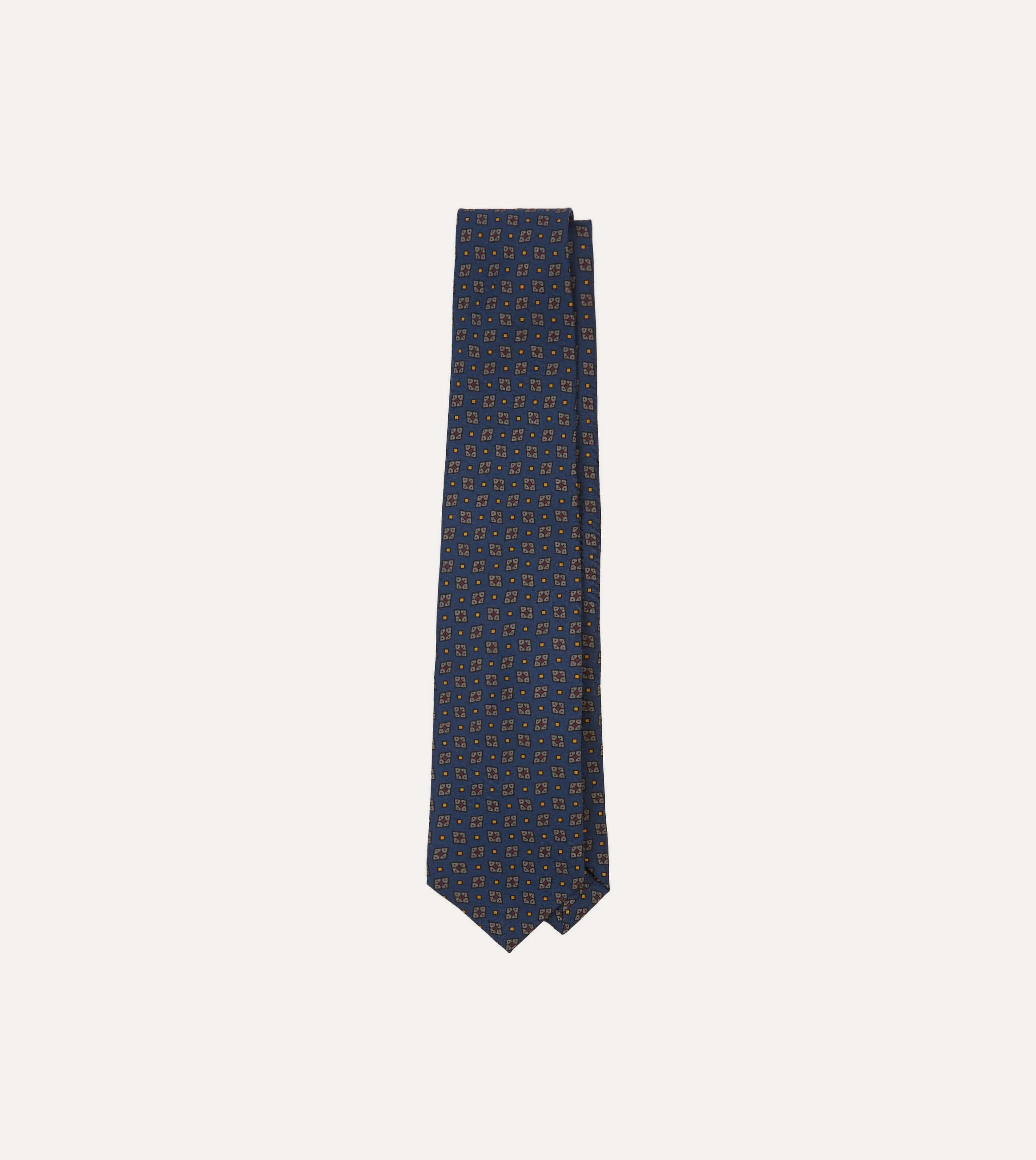 Navy Medallion Print Silk Twill Self Tipped Tie sold by Drake's London