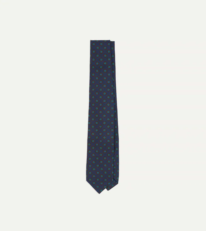 Navy Square Flower Medallion Print Silk Self Tipped Tie sold by Drake's London