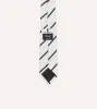 White and Navy Bar Stripe Repp Silk Tipped Tie sold by Drake's London
