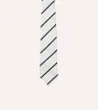 White and Navy Bar Stripe Repp Silk Tipped Tie sold by Drake's London