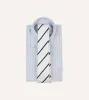 White and Navy Bar Stripe Repp Silk Tipped Tie sold by Drake's London