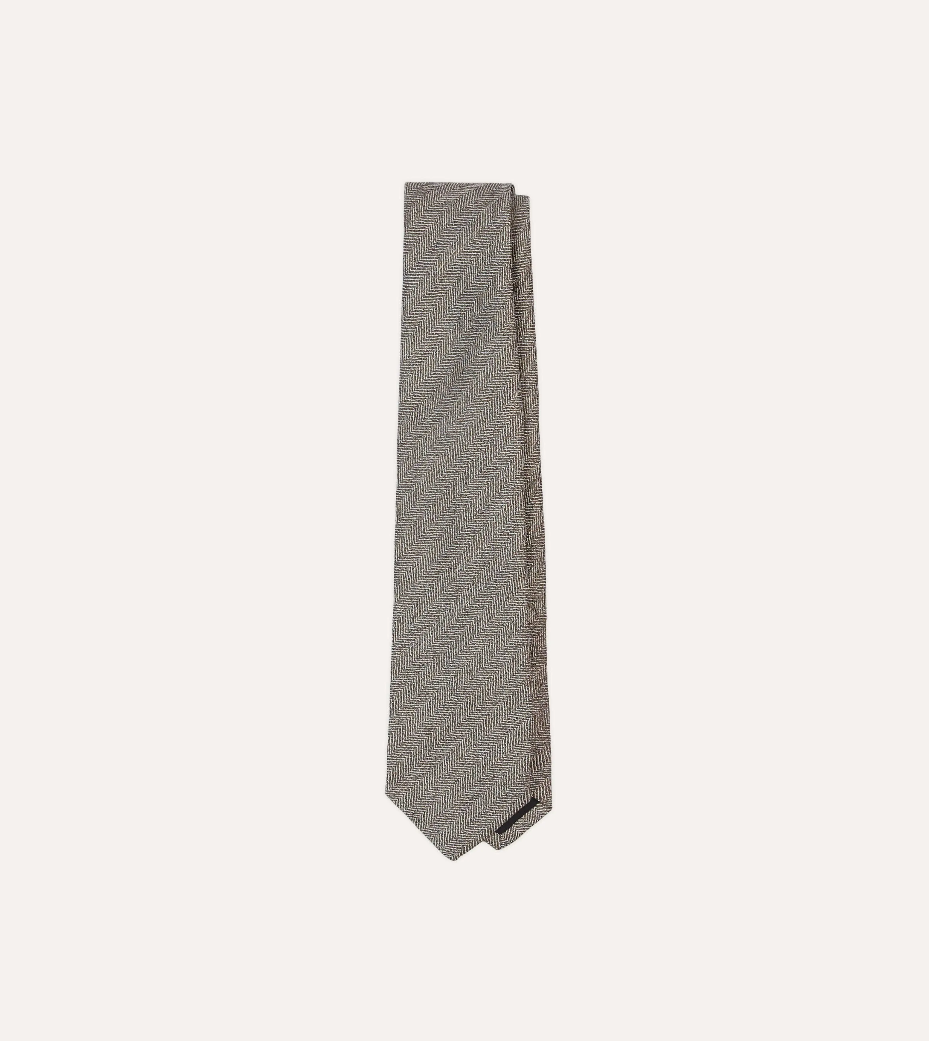 Brown and Ecru Herringbone Linen Silk Tipped Tie sold by Drake's London