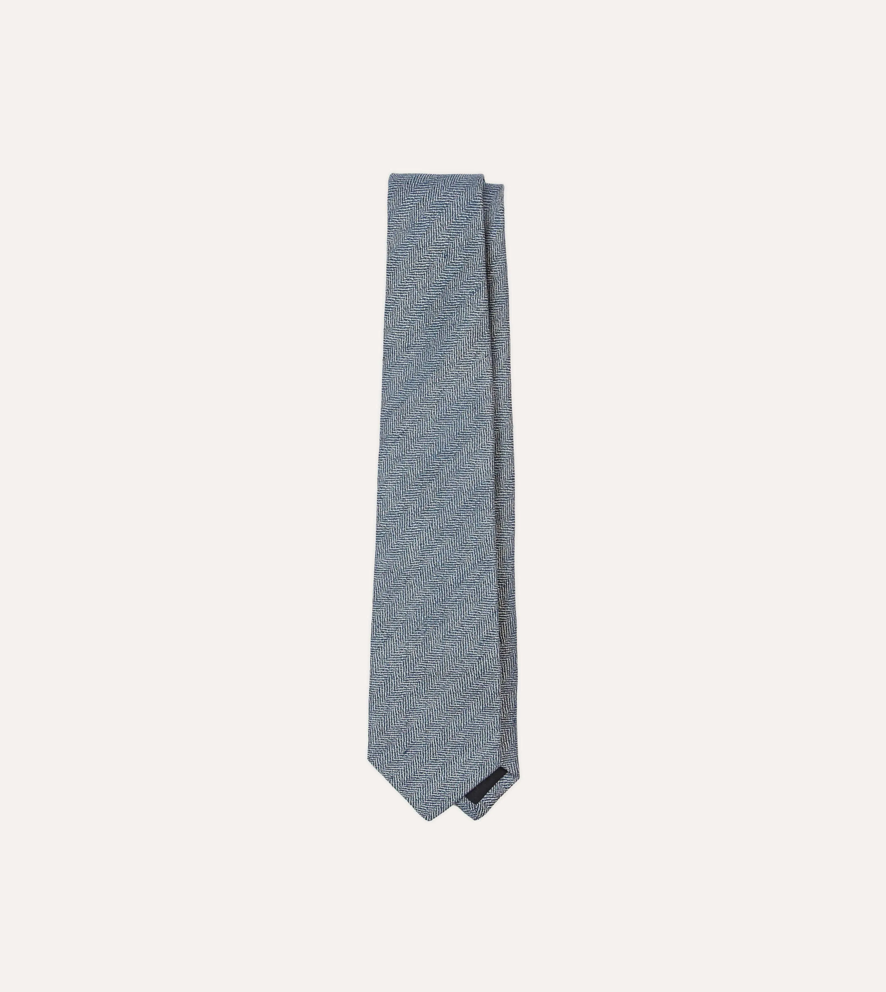 Navy and Ecru Herringbone Linen Silk Tipped Tie sold by Drake's London