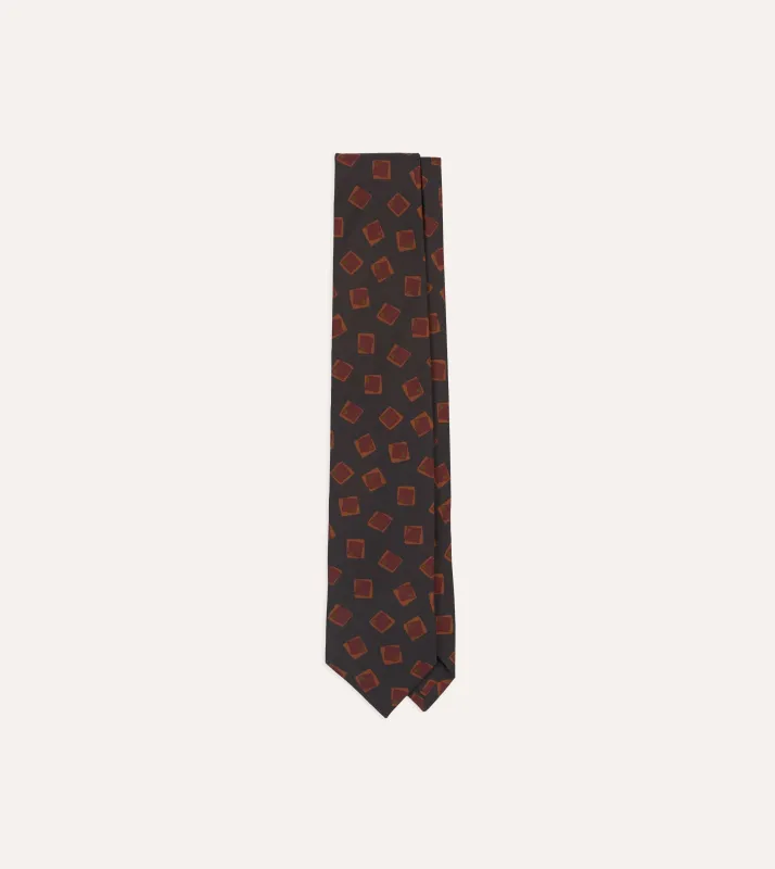 Navy Jumbled Tile Print Silk Self Tipped Tie sold by Drake's London