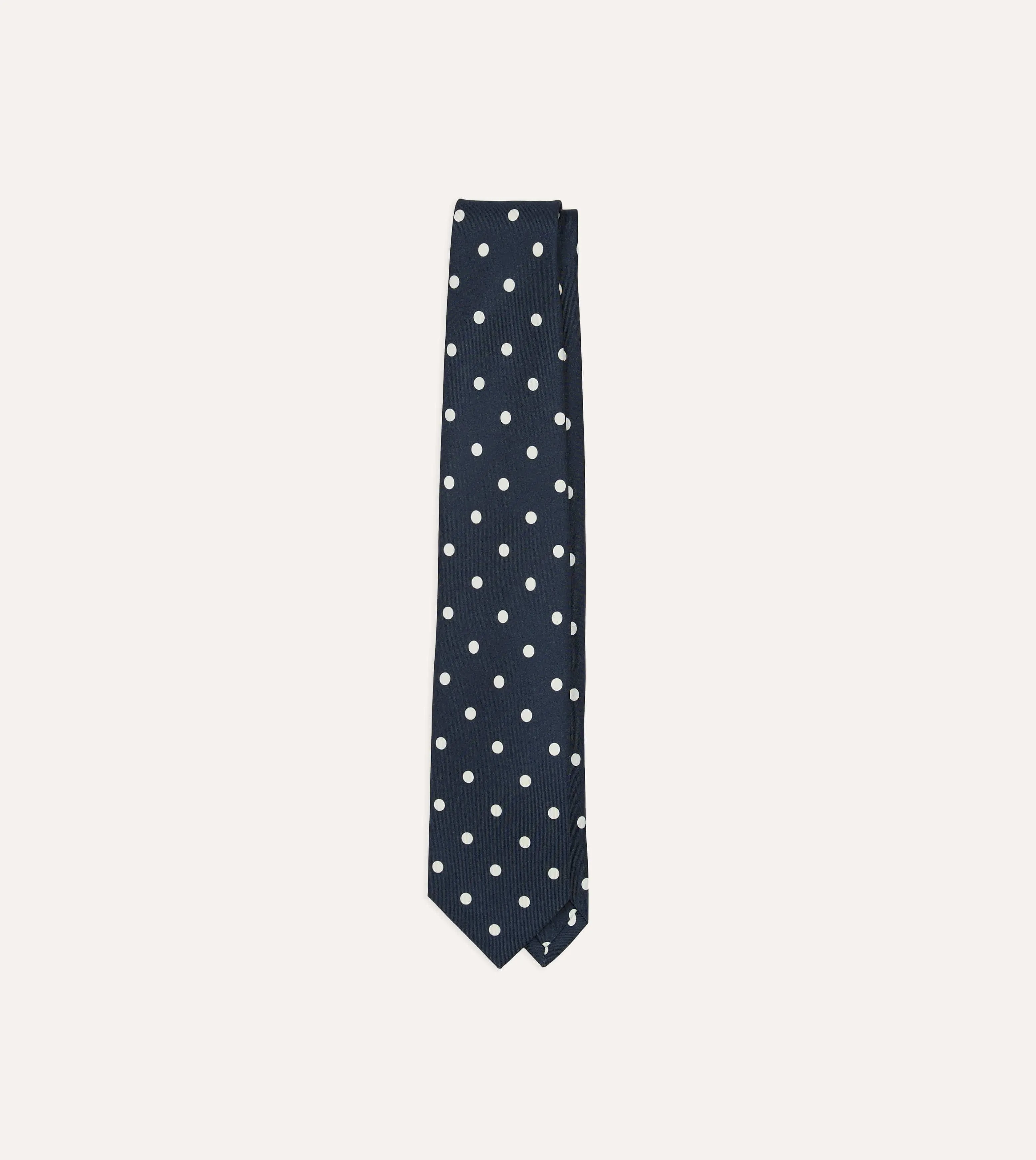 Navy Mini Polka Dot Silk Self-Tipped Tie sold by Drake's London