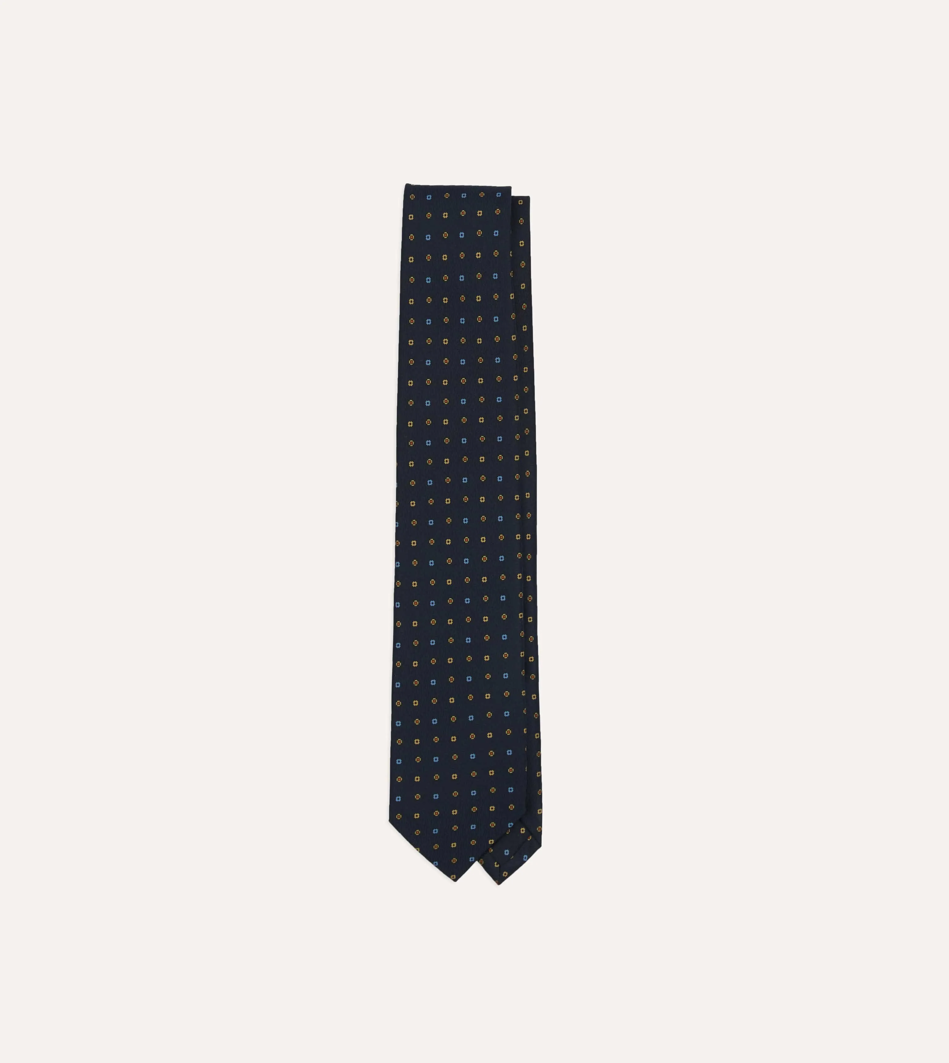 Navy Geometric Flower Print Silk Self-Tipped Tie sold by Drake's London