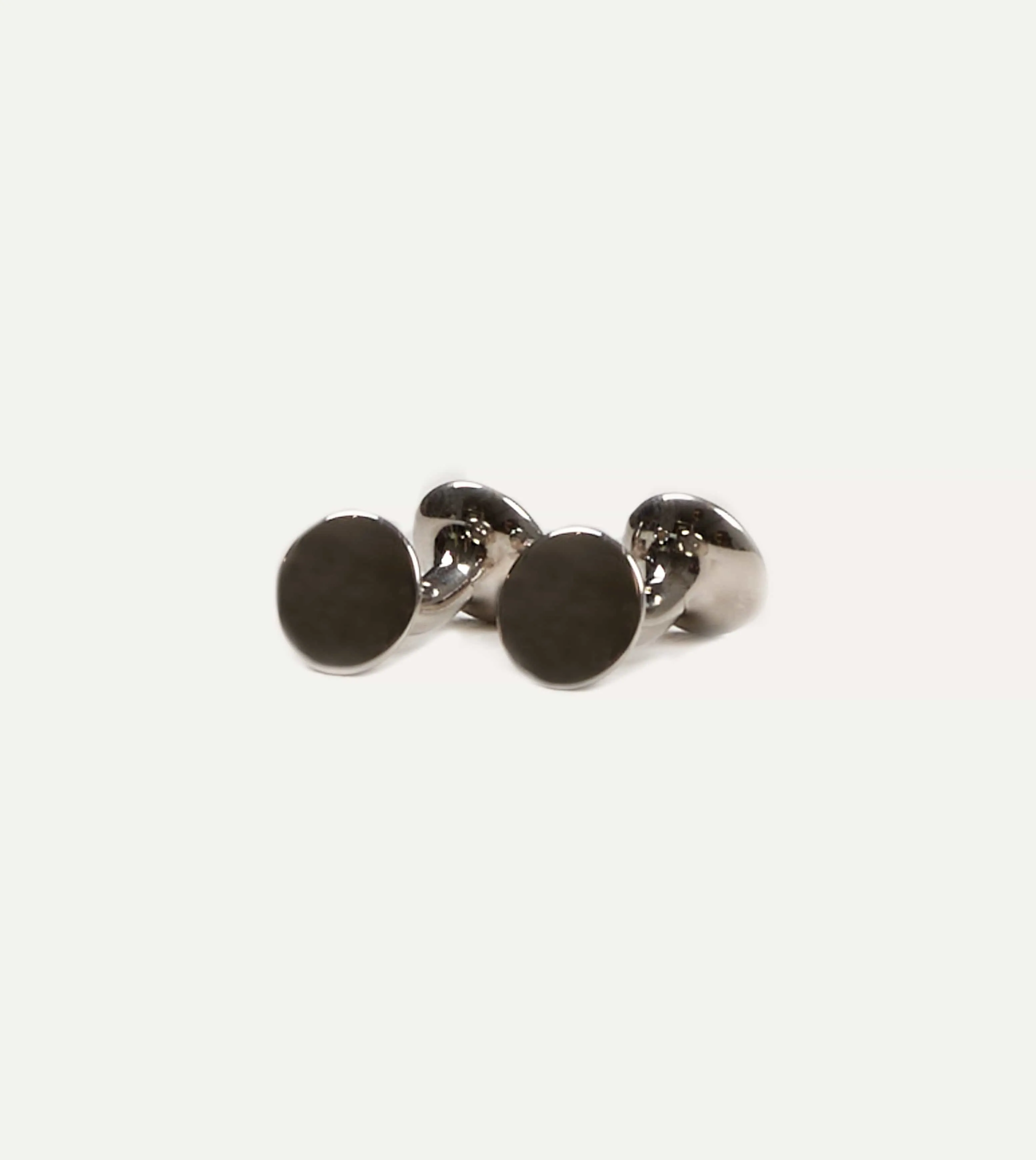 Codis Maya Rhodium Bow Cufflinks sold by Drake's London
