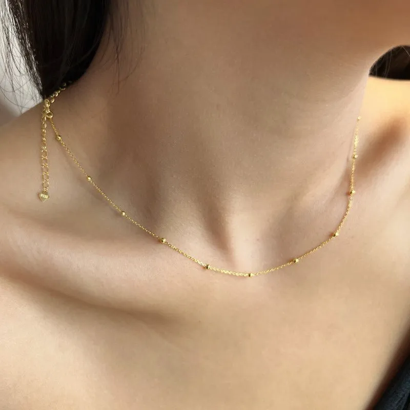 Gold Scattered Ball Necklace sold by Luxe Emporium product image thumbnail 2