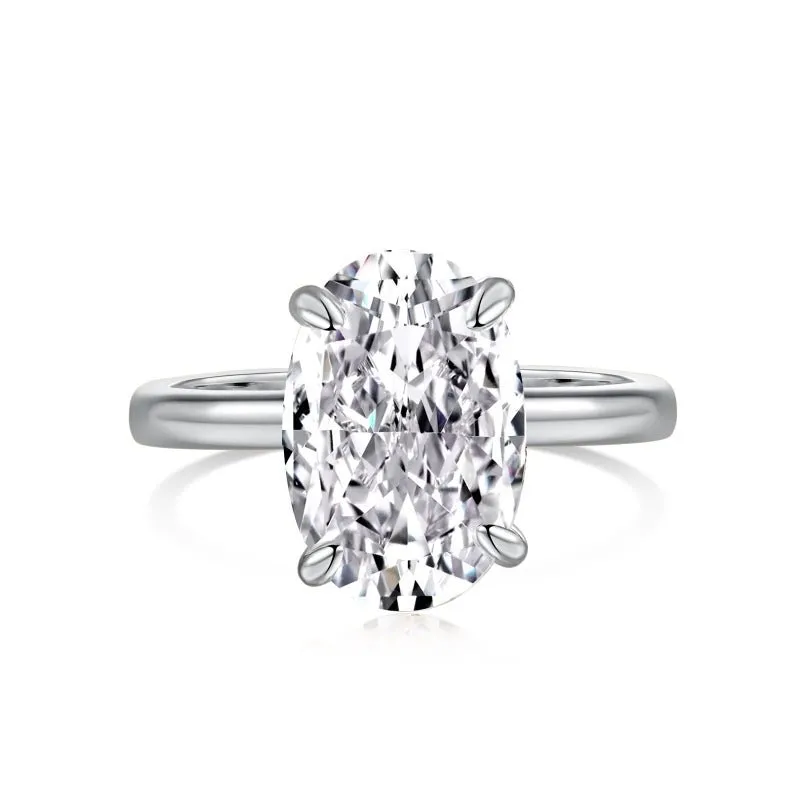 Sterling Silver Plain Band Solitaire Ring sold by Luxe Emporium