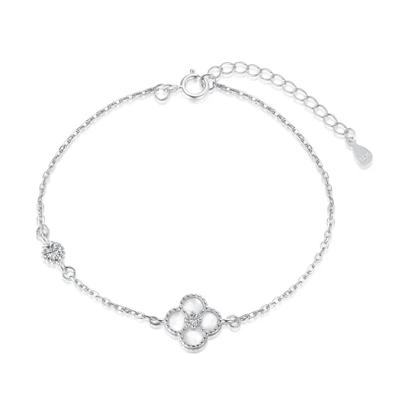 Sterling Silver White Clover Bracelet sold by Luxe Emporium