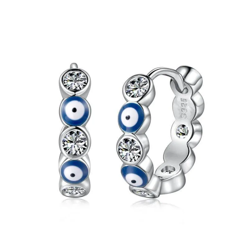 Sterling Silver Iced Evil Eye Huggie Hoop Earrings sold by Luxe Emporium