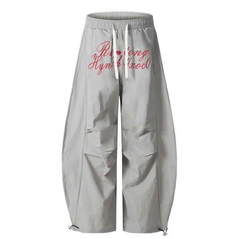 Omirad Script Graphic Nylon Wide-Leg Pants sold by Omirad