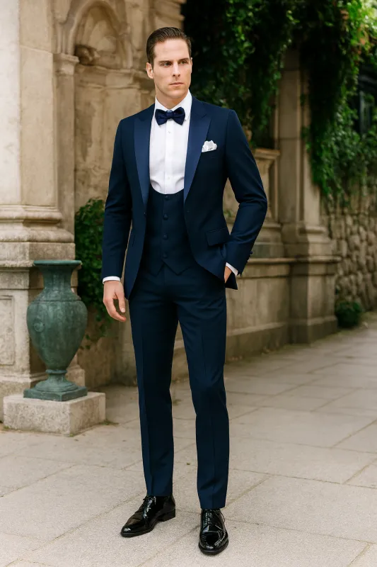 Men’s Navy Blue Tuxedo with Satin Peak Lapel with navy sateen  – 3 Piece Formal Suit with Vest and Bow Tie sold by Alberto Nardoni