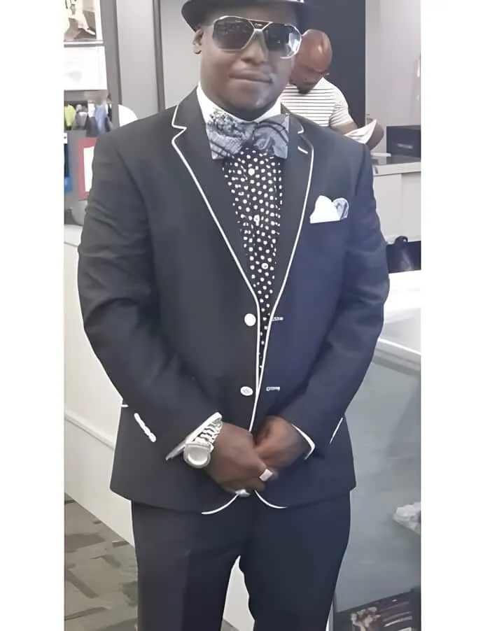 Black and White Trim Lapel Tuxedo Suit sold by Alberto Nardoni