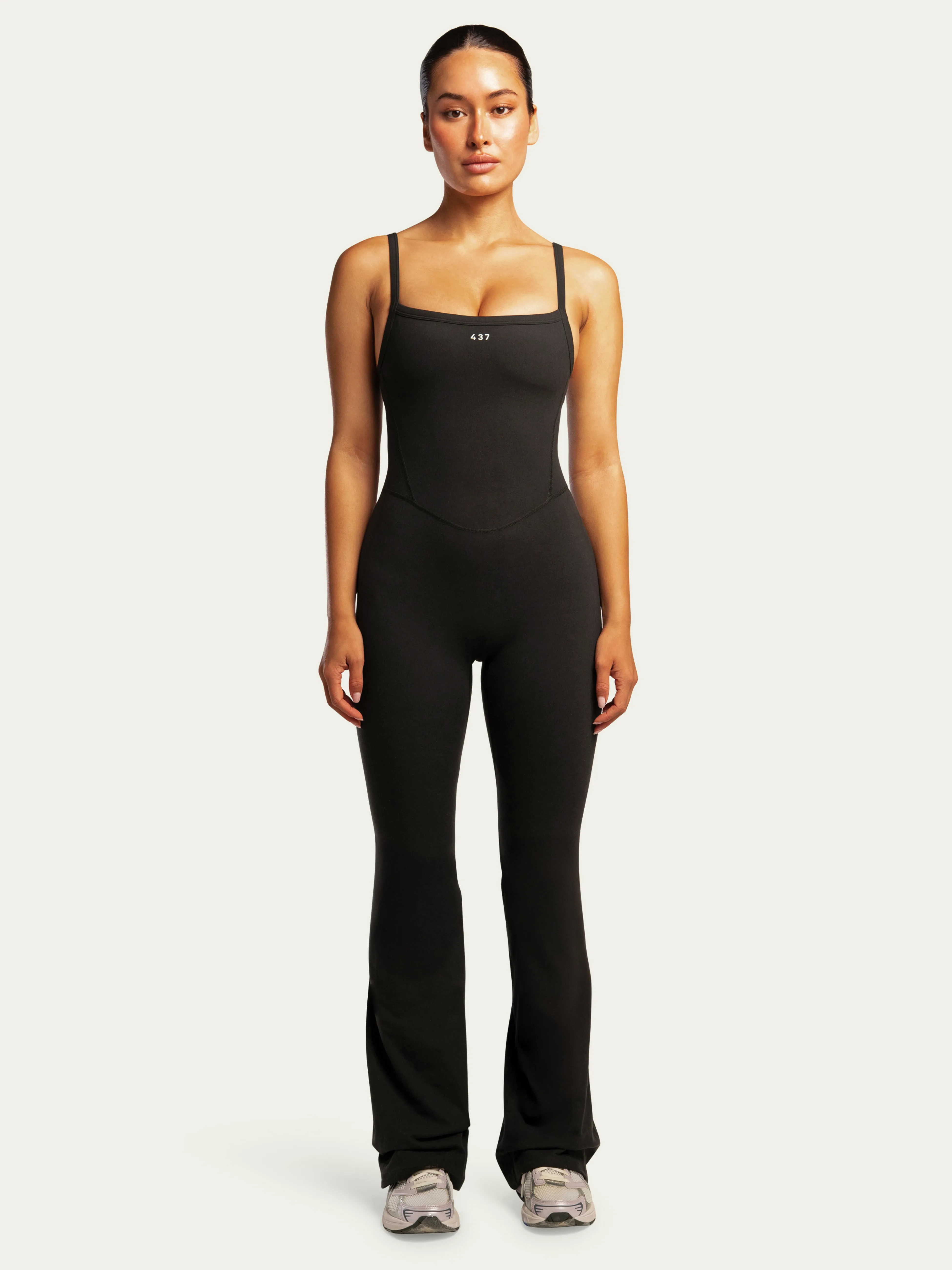 The Flare Onesie / Black sold by 437