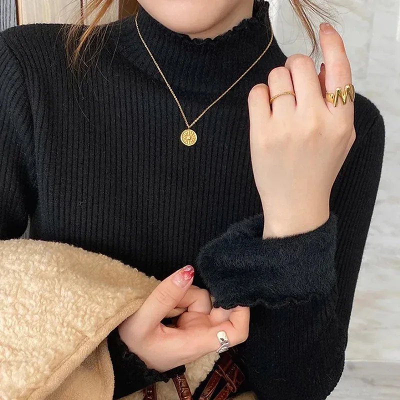 Tarra Women's Mock Neck Sweater with Ruffled Hem sold by Hensley London