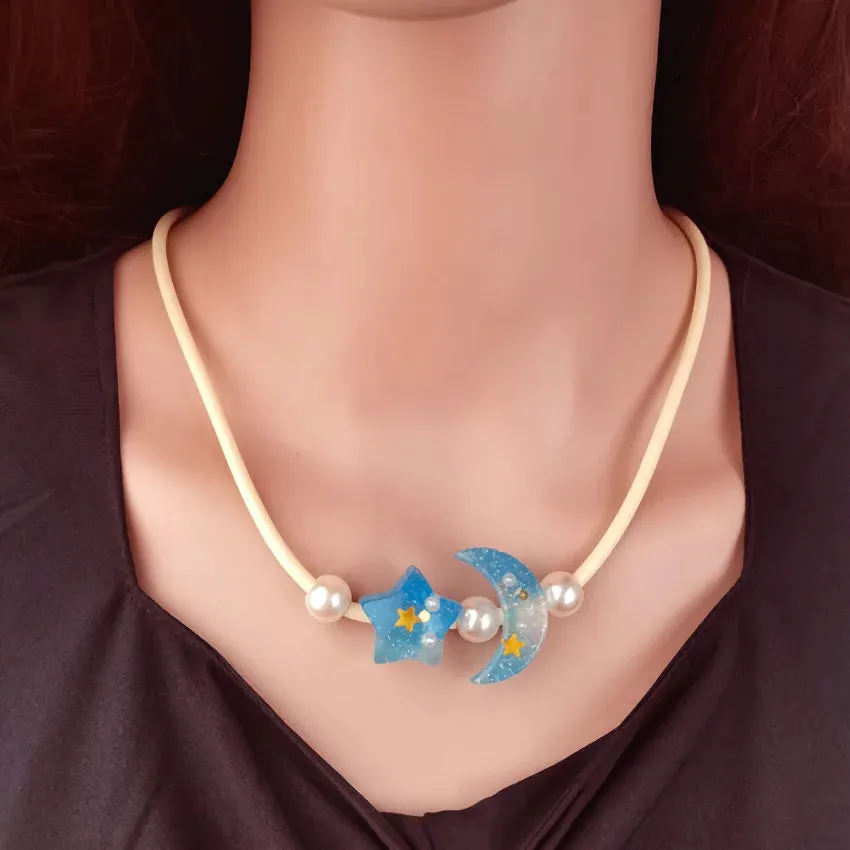 Women's Pendant Necklace Blue Beaded Chain with Star and Moon sold by Hensley London