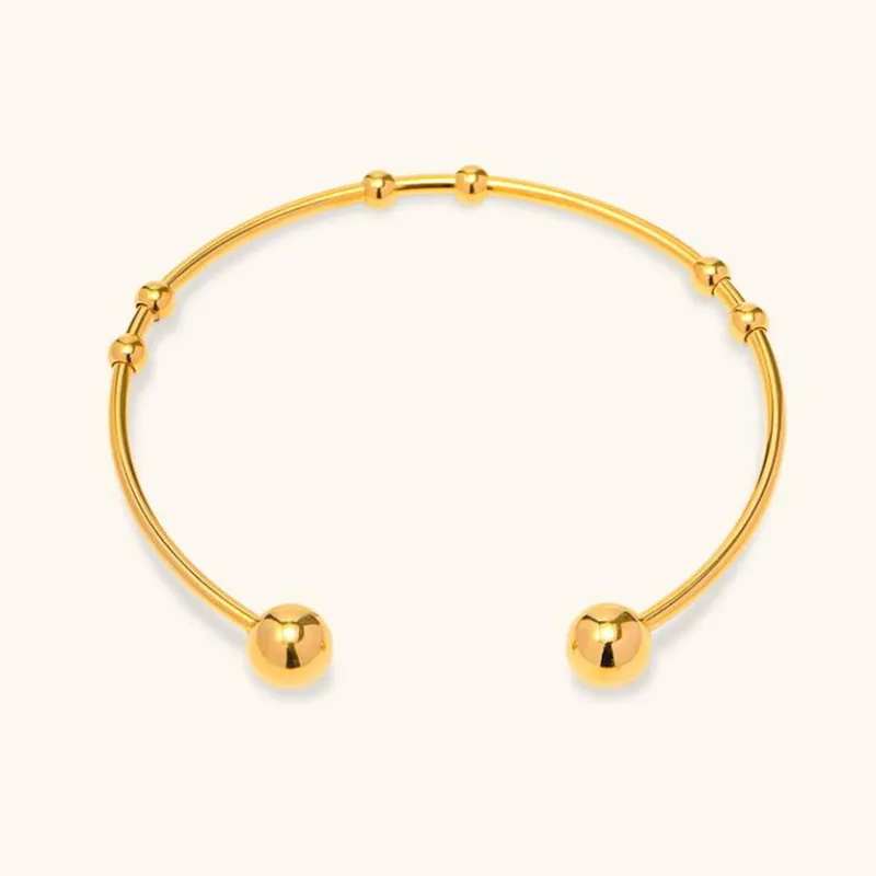 Women's Gold Bangle Bracelet Stainless Steel 18k Gold Plated sold by Hensley London