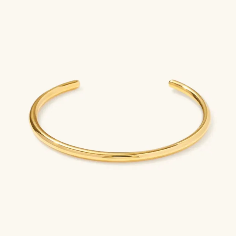 Women's Gold Bangle Bracelet Stainless Steel Minimalistic Design sold by Hensley London