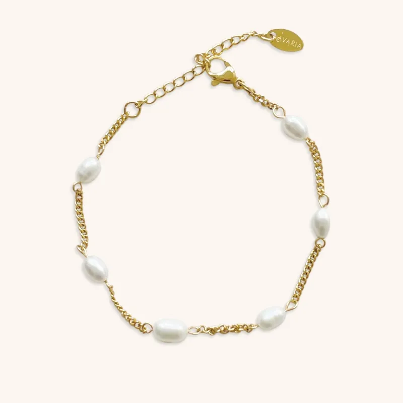 Women's Bracelet White Freshwater Pearls Gold Stainless Steel sold by Hensley London
