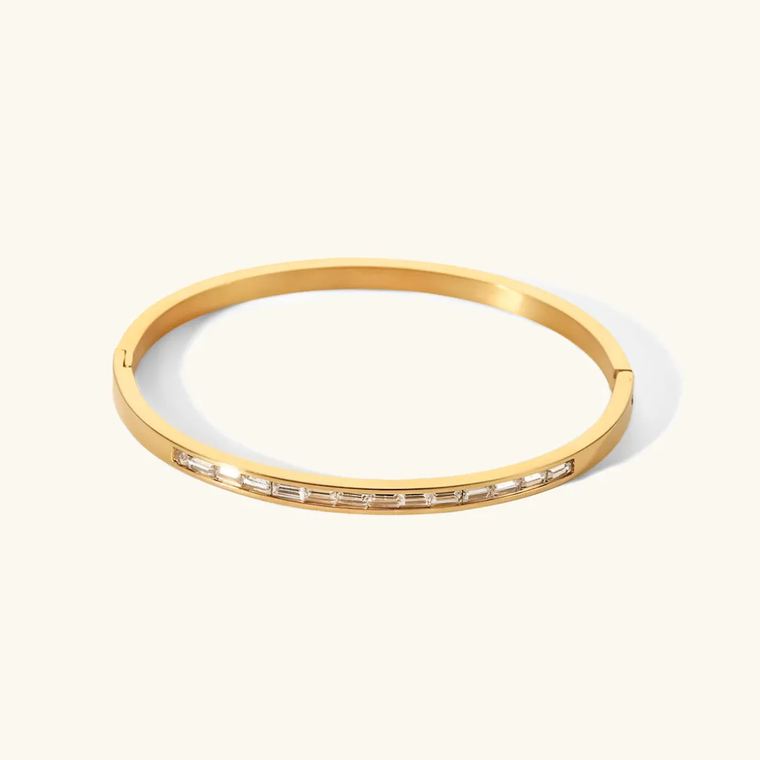 Women's Gold Bangle Bracelet with Diamond Simulants Stainless Steel sold by Hensley London