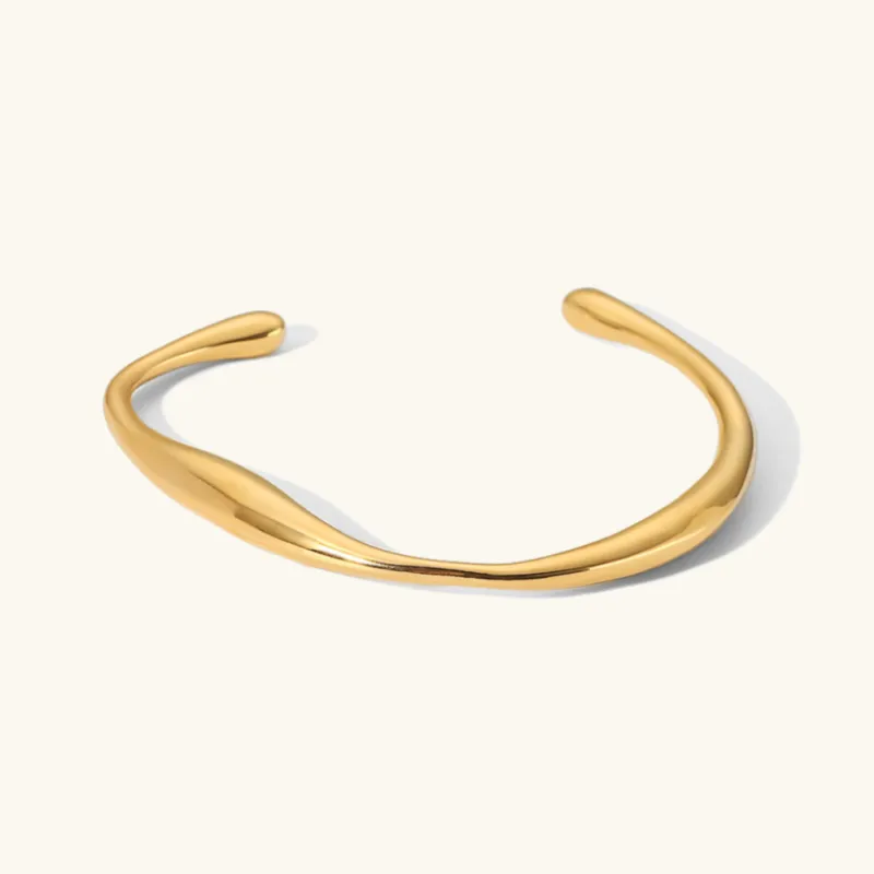 Women's Gold Bangle Twisted Stainless Steel 18k sold by Hensley London