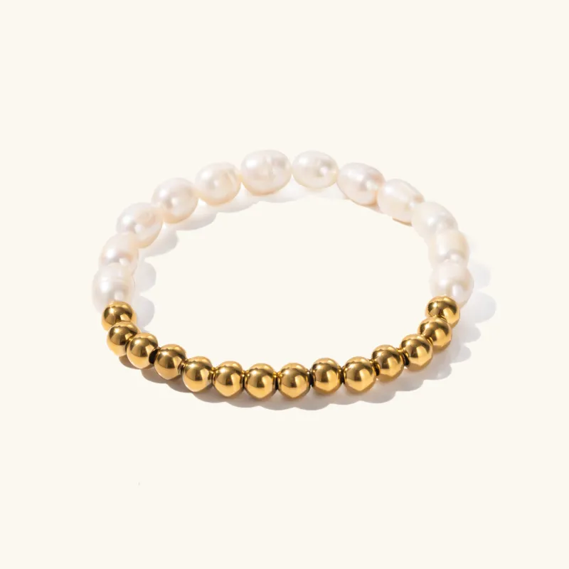 Women's Freshwater Pearl Bracelet Gold Stainless Steel sold by Hensley London