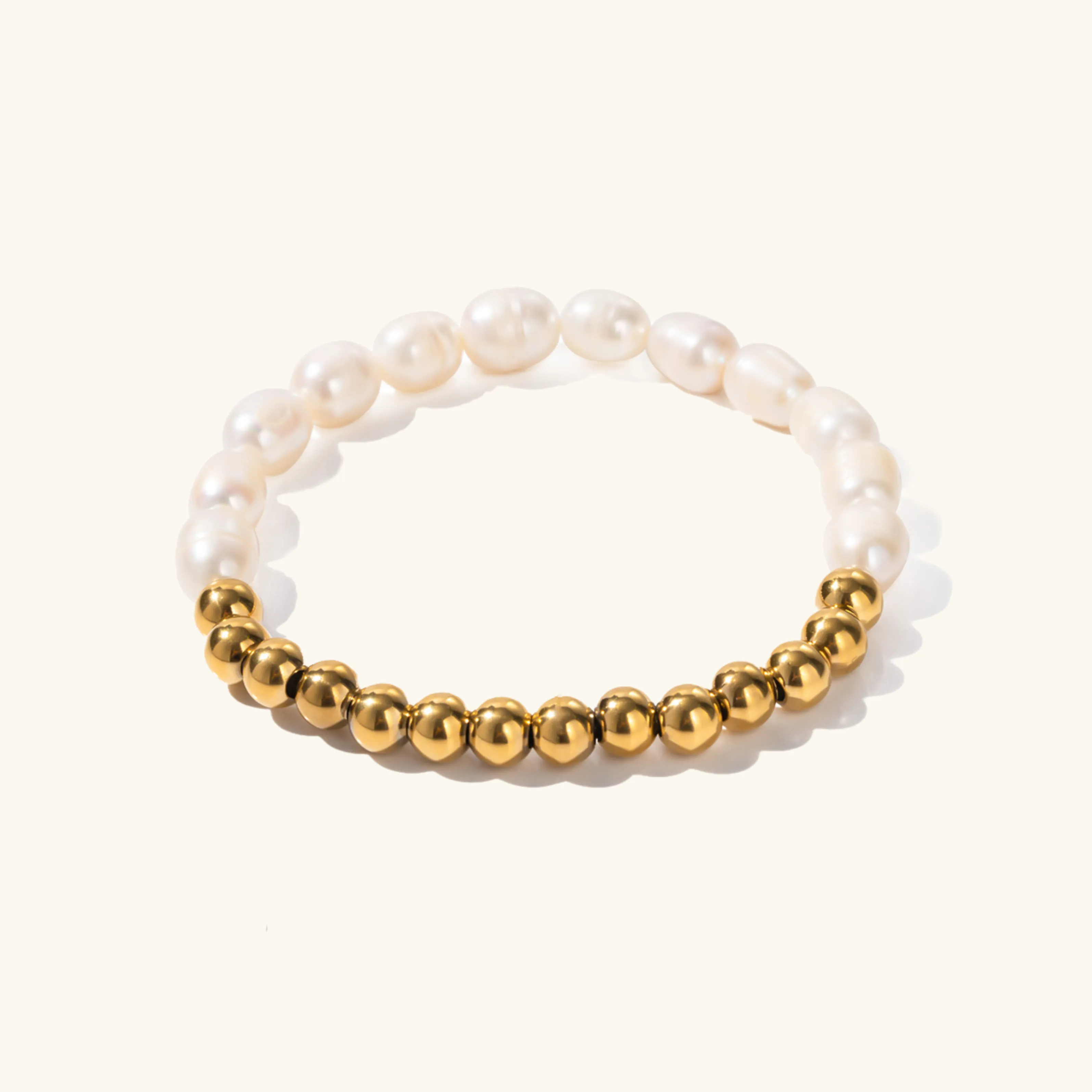 Women's Freshwater Pearl Bracelet Gold Stainless Steel sold by Hensley London